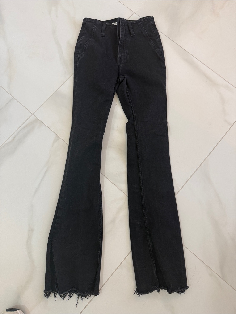 We The Free Black High-Rise Flare Jeans with Raw Hem